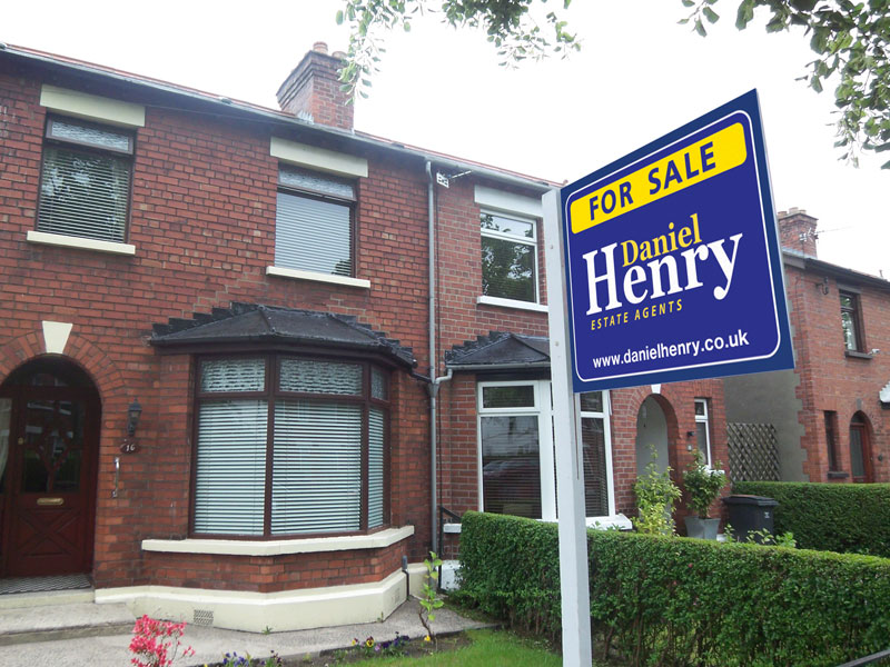 A Daniel Henry Estate Agent For Sale Board Erected Outside A Mid Terrace Property